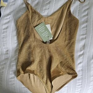 NEW - gold sparkly bodysuit